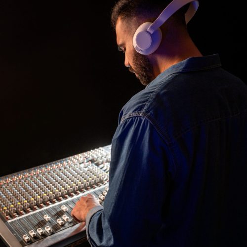 medium-shot-musician-wearing-headphones